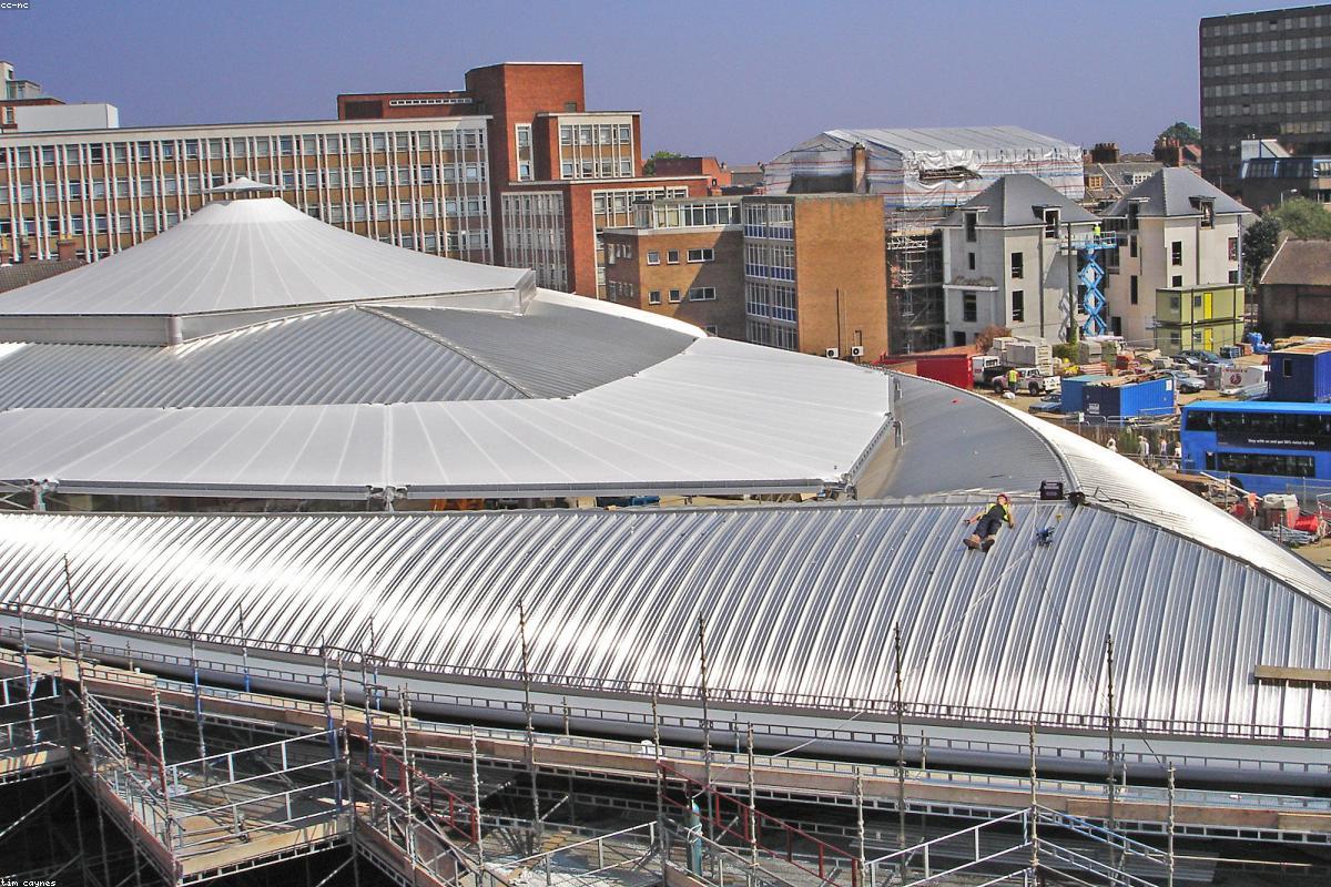 Large roof being re-covered with scaffolding in place